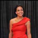 Actress Rosario Dawson smiles for Photographers on the red carpet