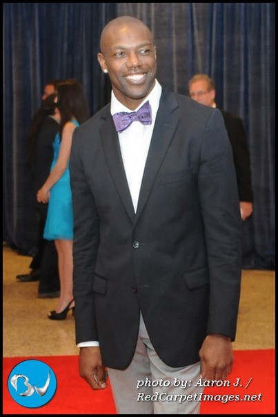 NFL Star Terrell "T.O." Owens stops for photos on the red carpet