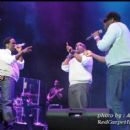 Boyz II Men perform on the main stage at the Superdome