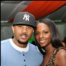 The Game's Hosea Chanchez and Tika Sumpter pose together in one of the V.I.P. Lounges at the Superdome