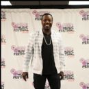 Singer Anthony Hamilton at Essence Music Fest 2011 poses for a pic backstage