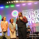 Gospel great Marvin Sapp (with his children) shares a few words with the Essence crowd after receiving an award