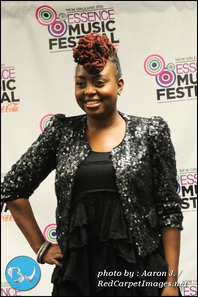 Singer Ledisi poses for a picture backstage at the Superdome
