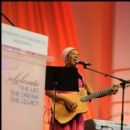 Indie Arie performs during the luncheon