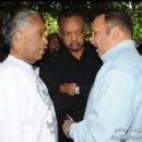 Marc Morial speaks with Rev Al Sharpton and Jesse Jackson backstage at the N.A.N. rally for jobs