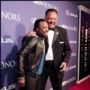 Singer Anthony Hamilton and Rev Jesse Jackson share a laugh on the carpet of the 2012 BET Honors