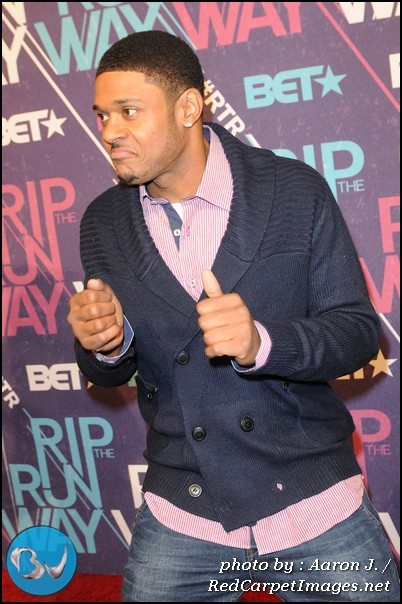 BET Rip the Runway Co-Host Pooch Hall does a little dance on the red carpet