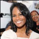 Actress Robinne Lee smiles for Photographers as she arrives to the screening of The Shepherd
