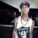 Tyga wearing raiders shirts