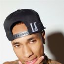 Tyga showing off his tattoos