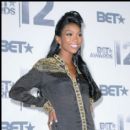 Singer Brandy strikes a pose in the press room at the 2012 BET Awards