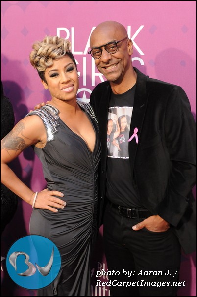 Keyshia Cole with BET Vice-President Stephen G. Hill