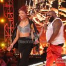 Rick Ross and Meek Mill perform during BET Rip the Runway